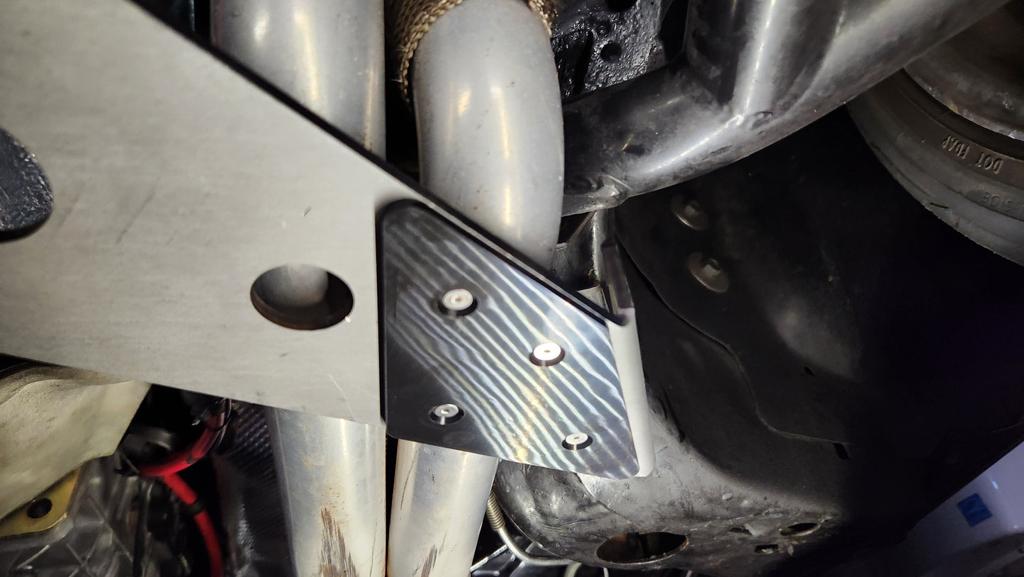 1964 to 1972 GM A-Body Oil Pan Protection Plate Skid Plate Delrin pad close up on 1969 Pontiac GTO