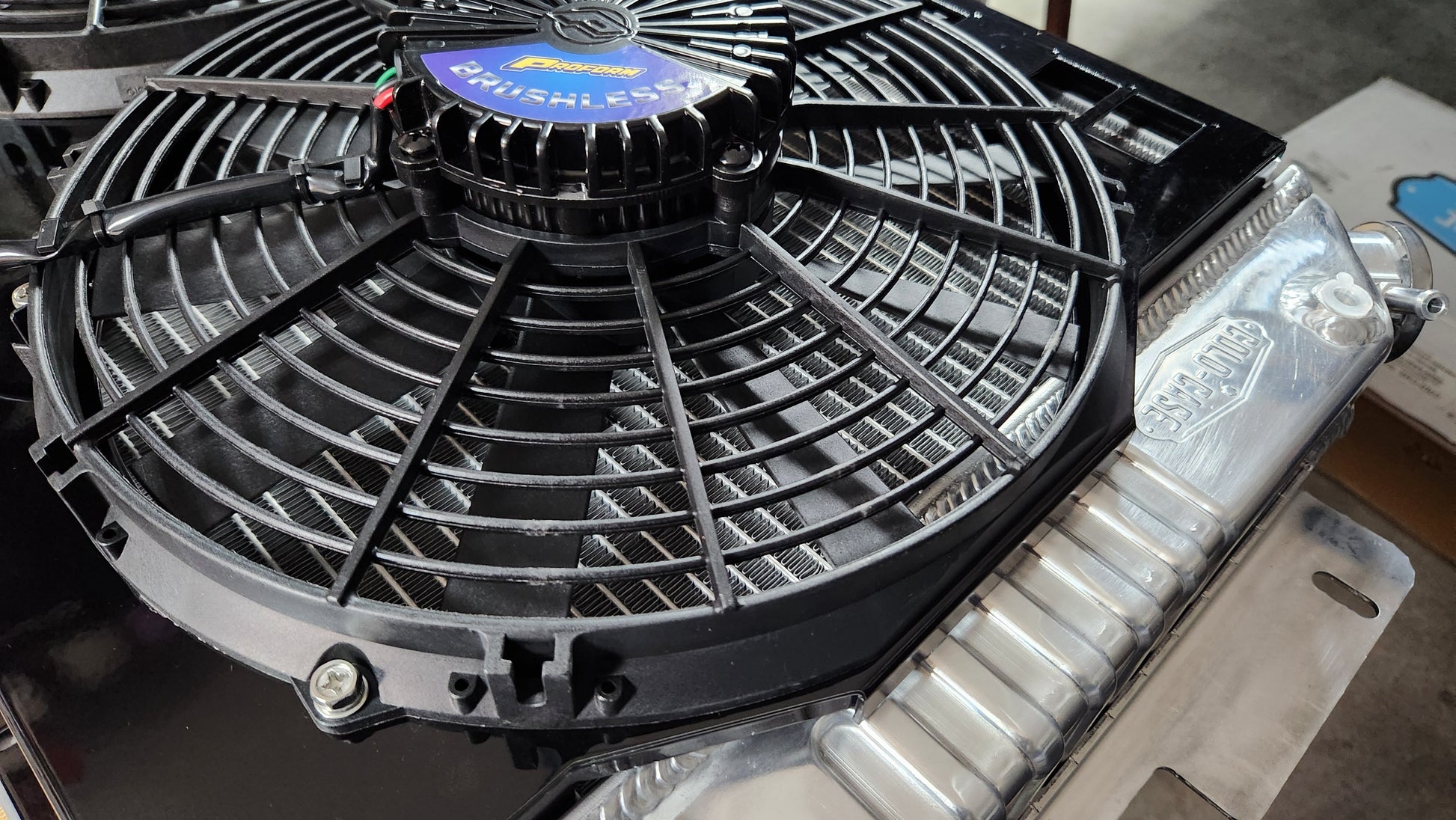 Close up of a Proform 12 inch Brushless fan on a Cold Case Radiator CHC11 with custom Black Fan Shroud fits 1967 to 1969 GM F Body's in Black