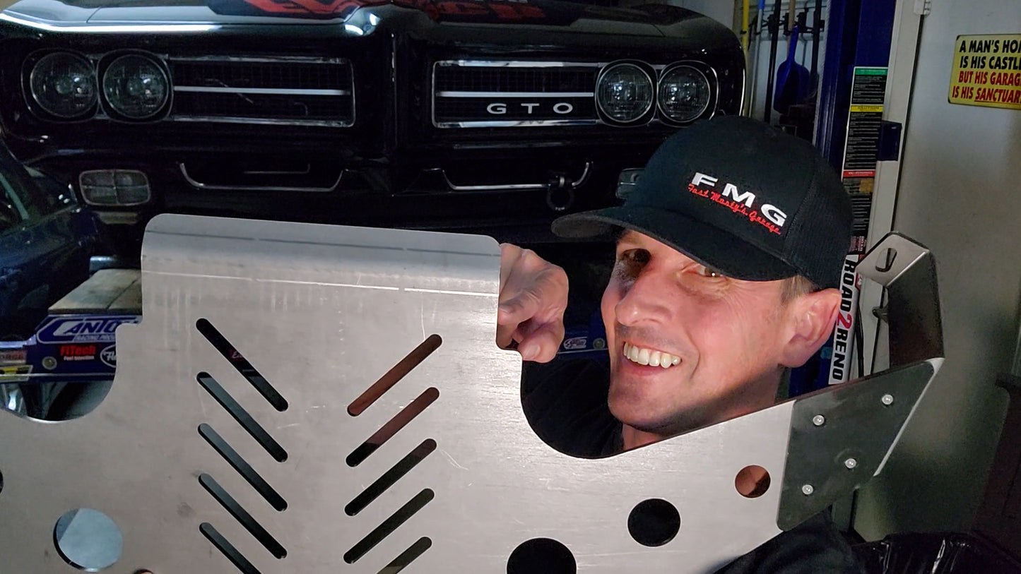 1964 to 1972 GM A-Body Oil Pan Protection Plate Skid Plate with Monty in front of 1969 Pontiac GTO