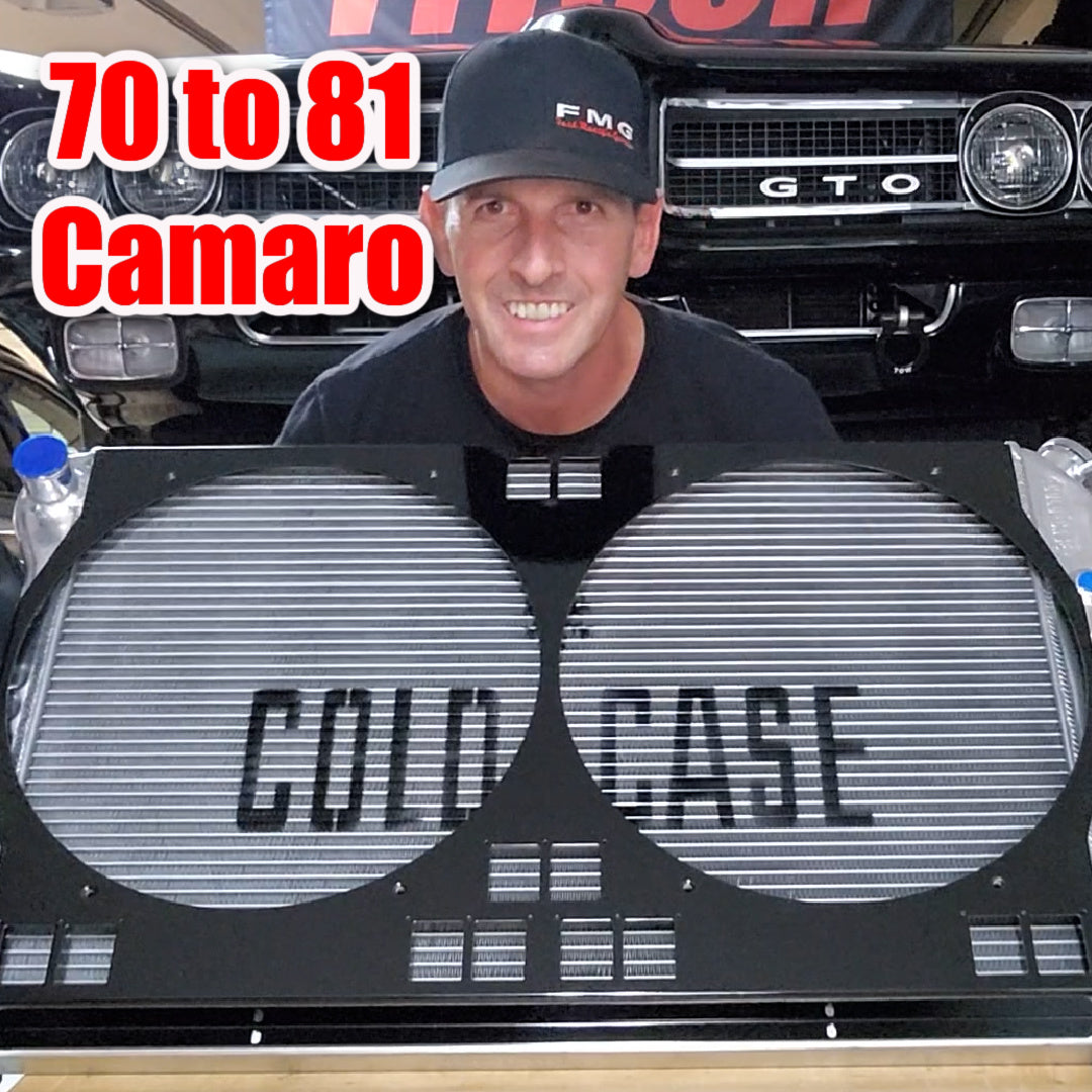 Monty standing behind a 'Cold Case' radiator CHC545 with custom shroud for a 1970-1981 Camaro, with a 1969 GTO in the background