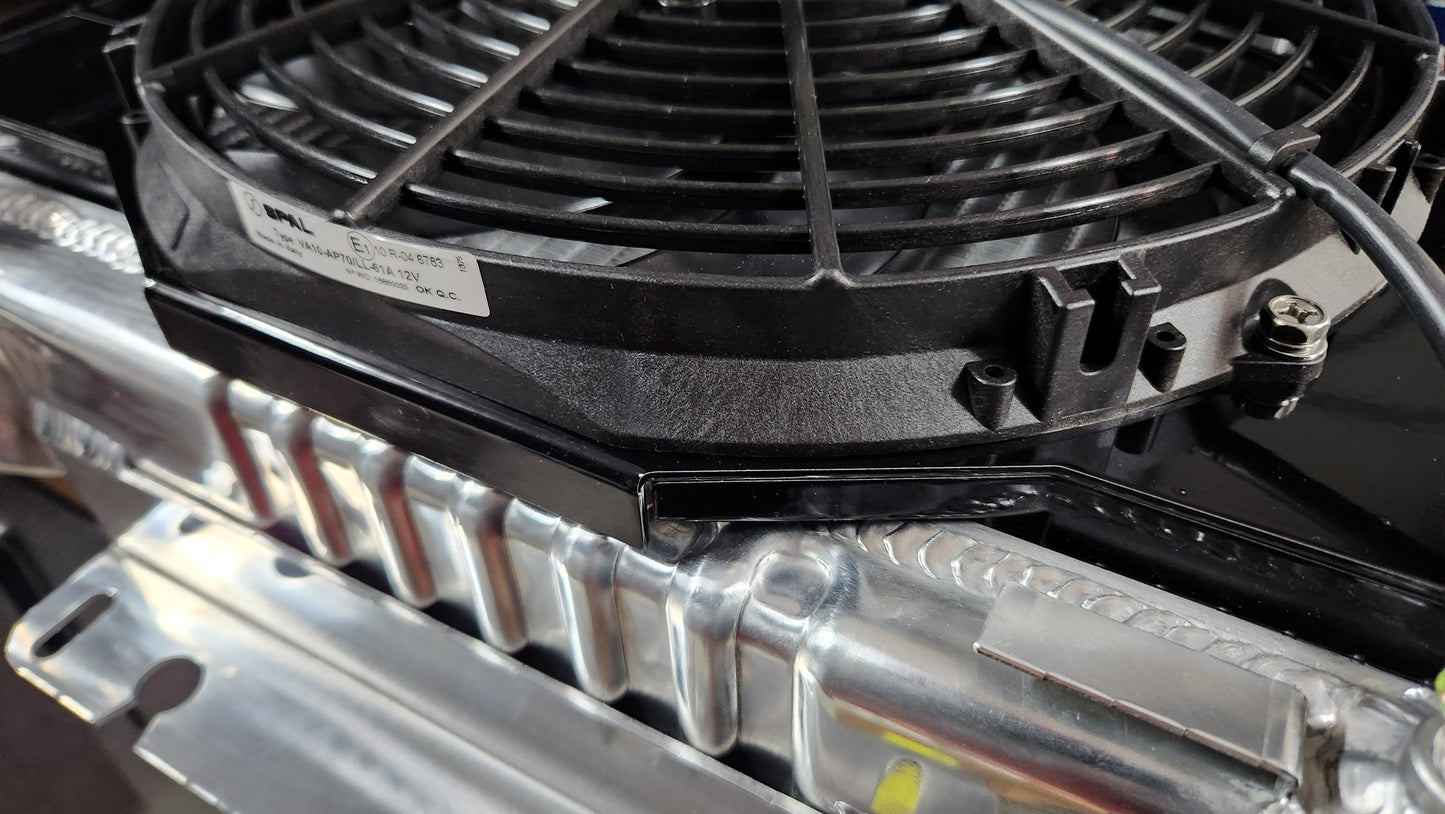 Close up view of Cold Case Radiator CHC11 with custom Black Fan Shroud fits 1967 to 1969 GM F Body's also showing a 12 inch SPAL Brushed Fan.