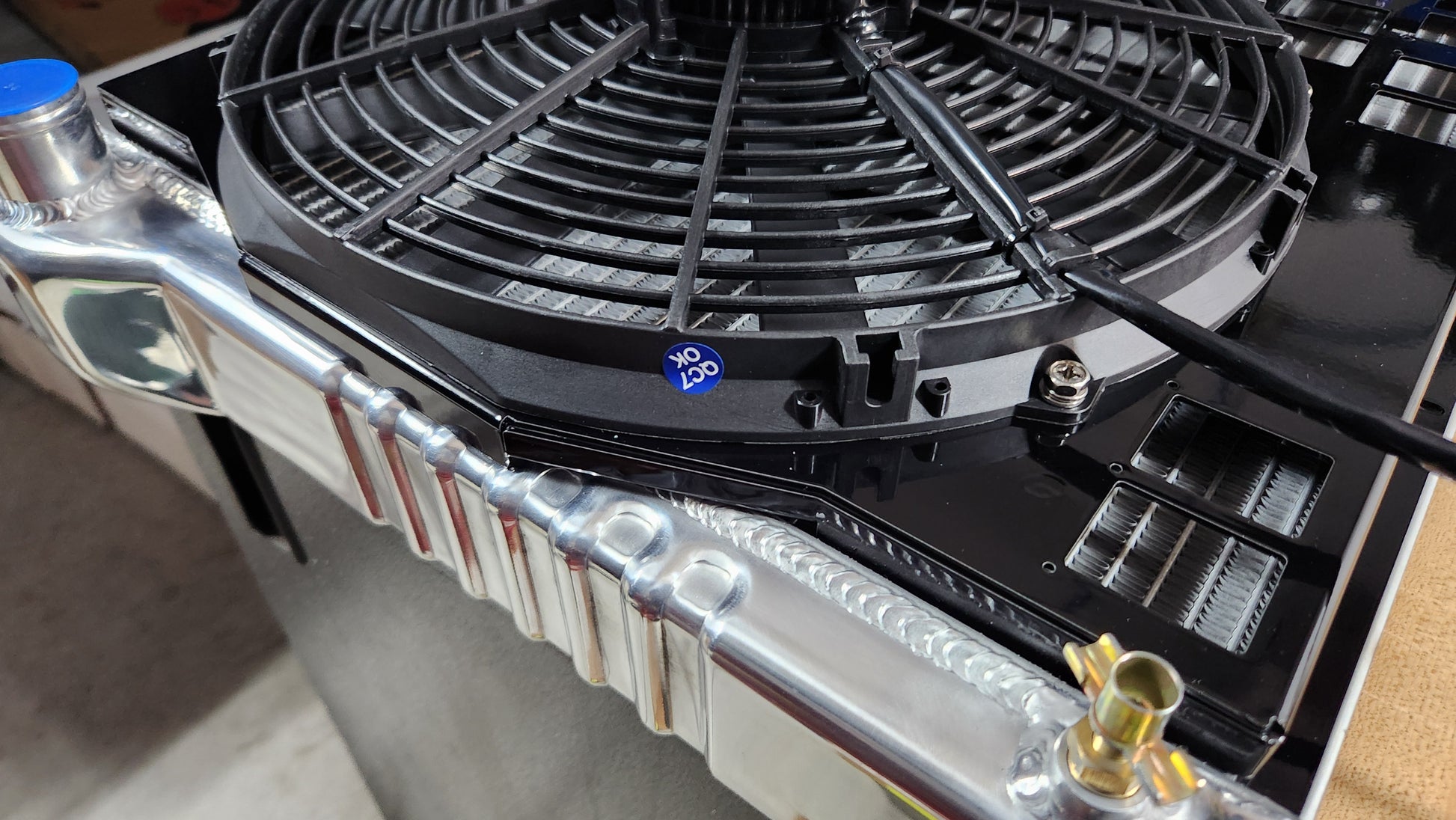 Close up weld seam view of Dual 14 inch Proform Brushless fans mounted on Cold Case radiators CHC545