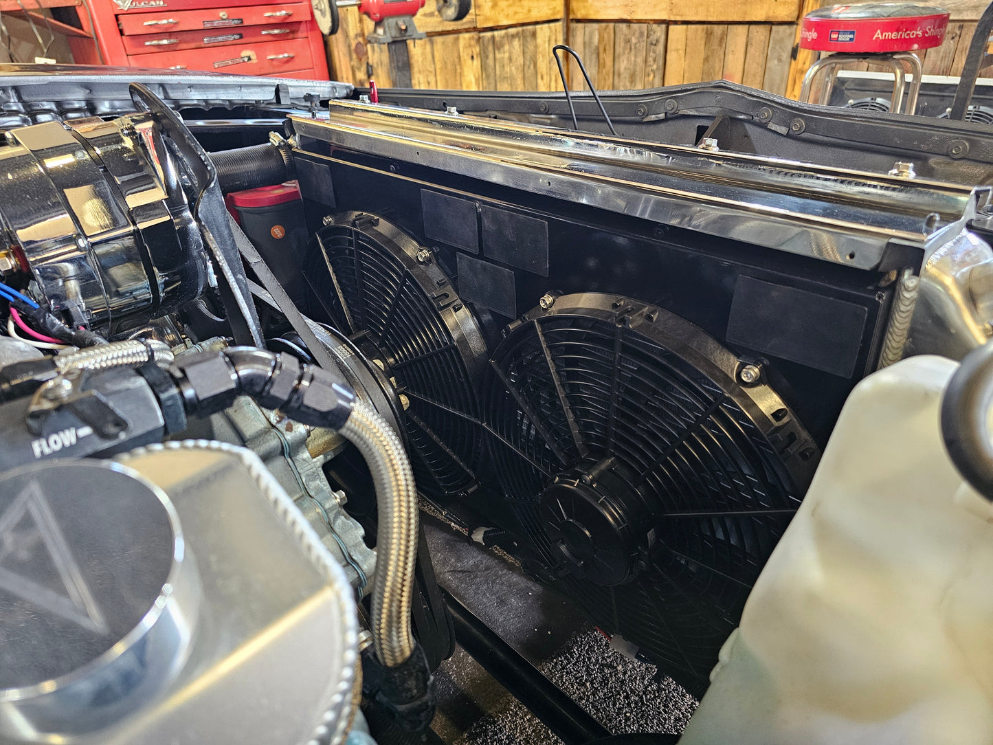 FMG dual 14 inch fan shroud mounted on a Cold Case GPF18 in a 1970 Pontiac Firebird with SPAL fans.